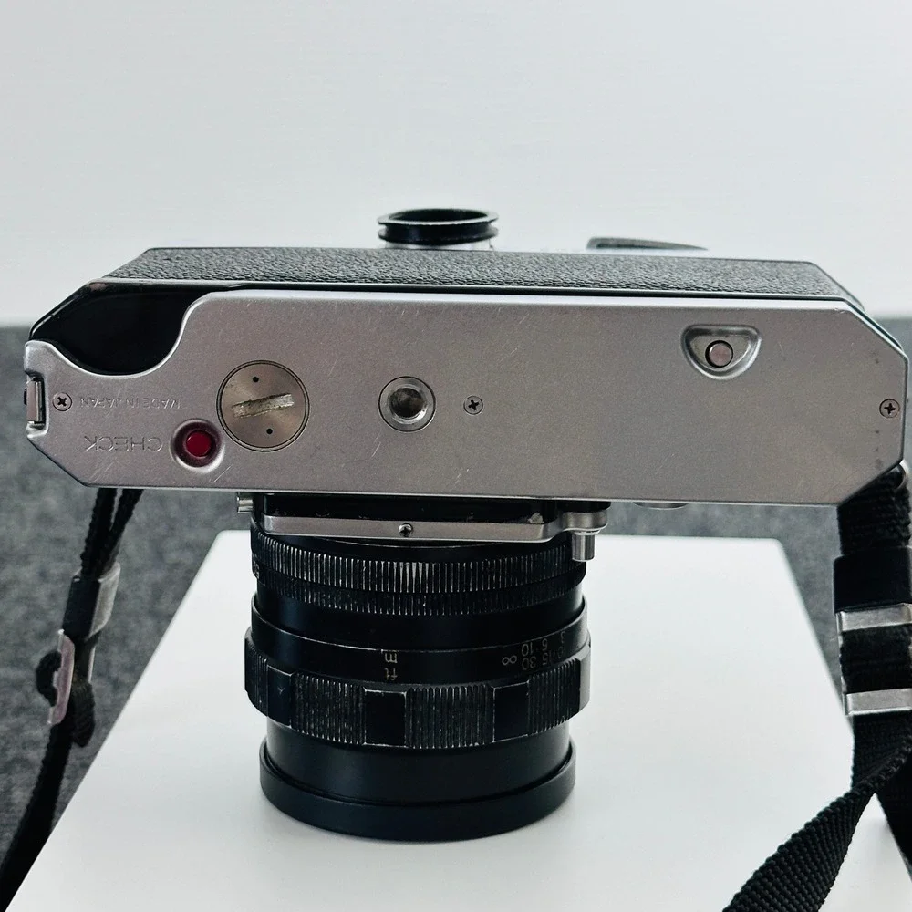Konica Autoreflex T 35mm SLR Film Camera with Soligor Lens Silver Black UNTESTED
